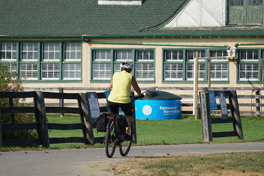 E-bike rider near Windfields Farm at Ontario Tech University's north Oshawa location.