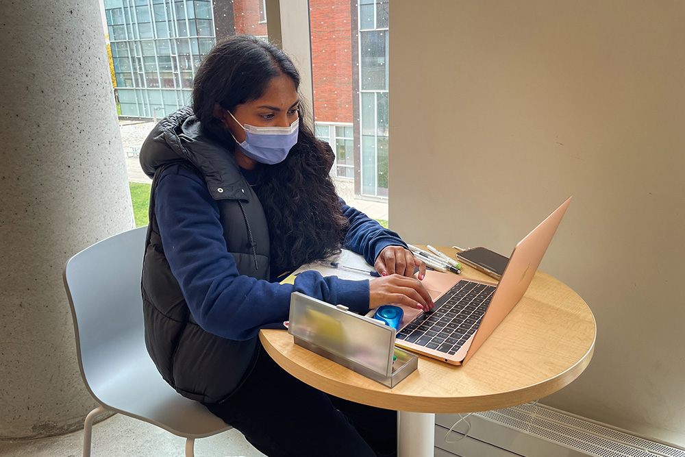 Student wearing mask on campus