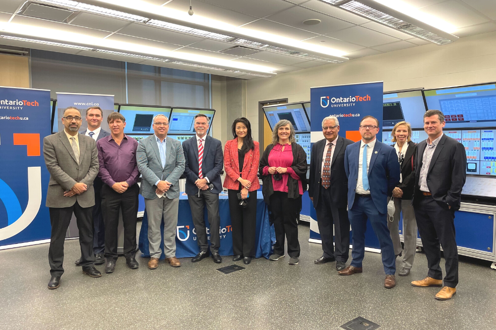 Group of image of attendees at MOU signing ceremony at Ontario Tech University (November 28, 2022).
