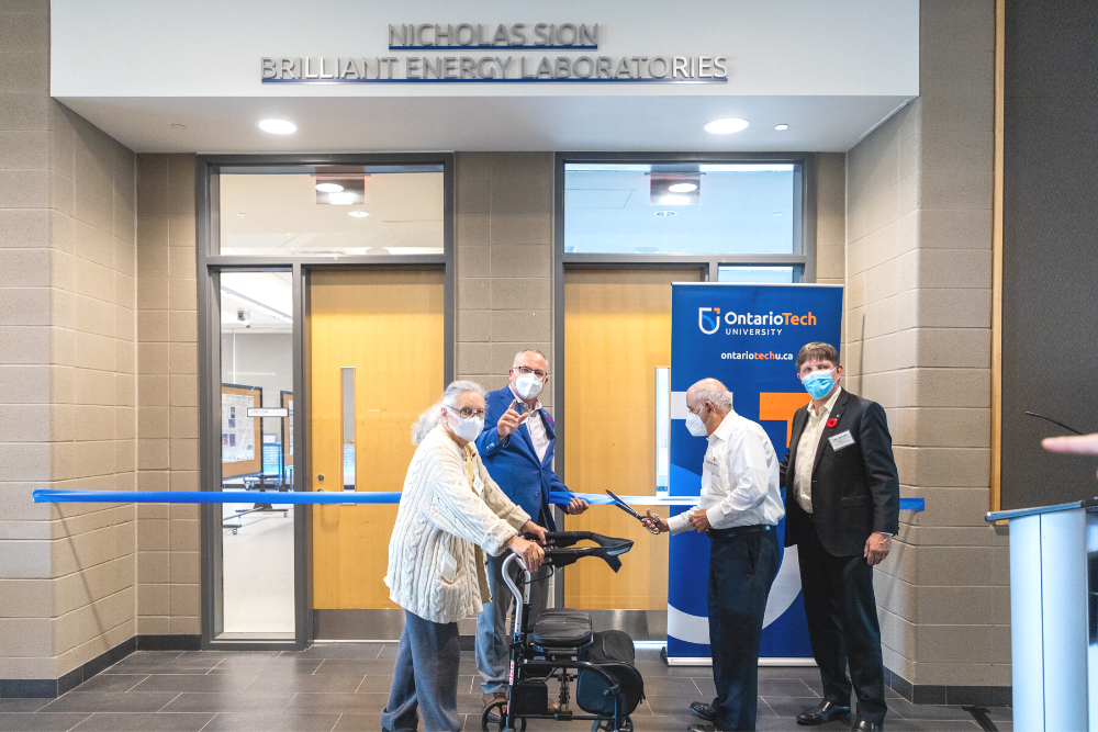 Ribbon-cutting ceremony to celebrate the legacy of Nicholas Sion, late engineer and founding donor of the Brilliant Energy Institute (November 2, 2022). From left: Maria Beasley (longtime friend of Nicholas Sion); Dr. Steven Murphy, President and Vice-Chancellor, Ontario Tech University; Victor Sion (brother of Nicholas Sion); Dr. Les Jacobs, Vice-President, Research and Innovation, Ontario Tech University.