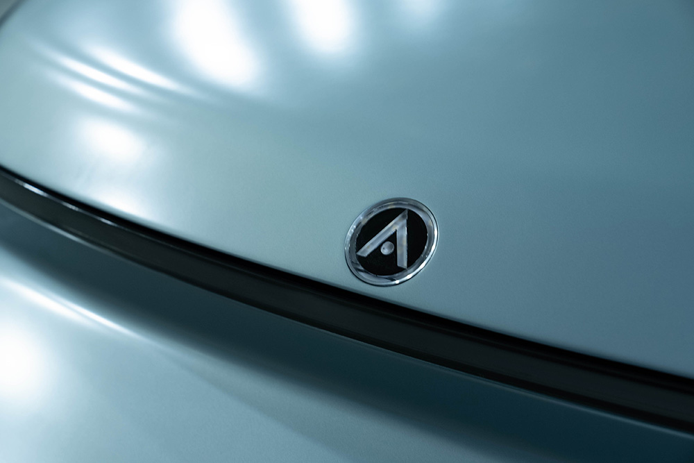 Iconic Arrow logo on the vehicle.