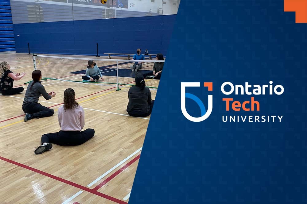 Students try seated volleyball at the Campus Wellness and Recreation Centre.