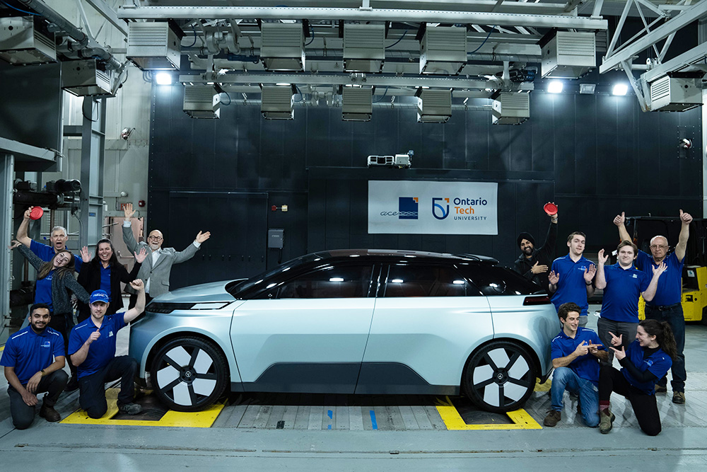 Ontario Tech University Project Arrow team celebrates the creation of the Arrow, the highly anticipated all-Canadian concept electric vehicle (inside the ACE Aerodynamic Climatic Wind Tunnel at Ontario Tech, December 2022, prior to the subsequent January 5, 2023 global unveiling in Las Vegas, Nevada). 