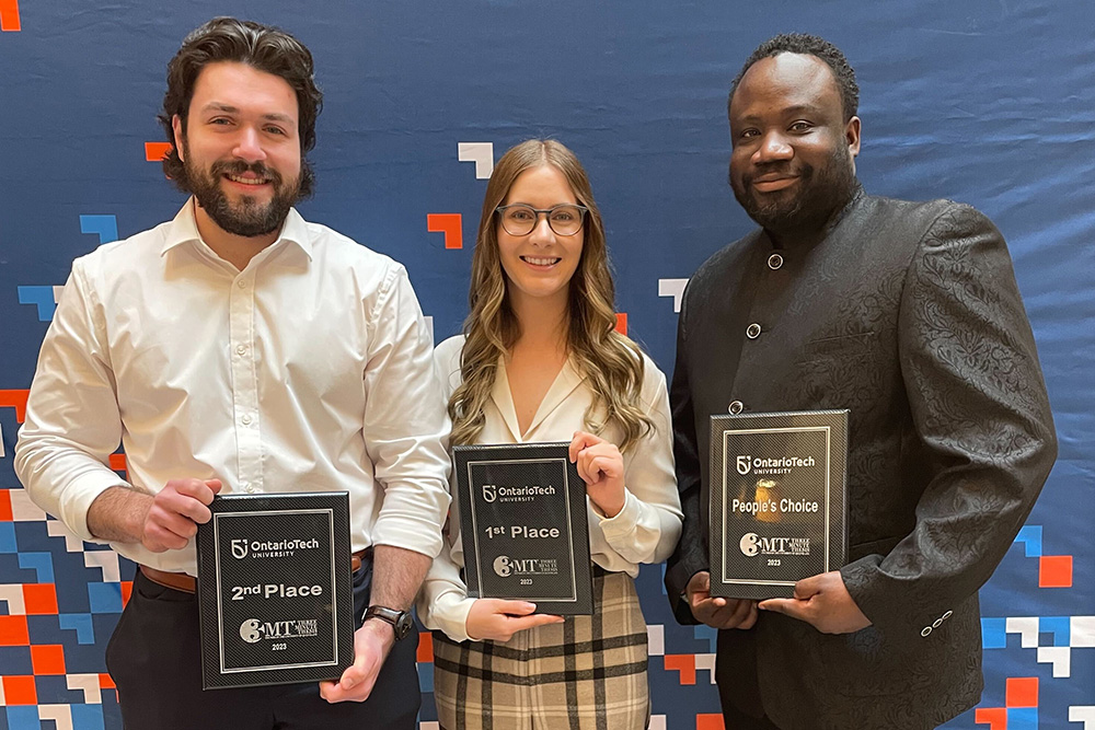 From left: Colin Elliott, Sarah Rijkenberg, and Bismark Addo-Binney were the winners of the Ontario Tech’s Three Minute Thesis competition on March 23. 