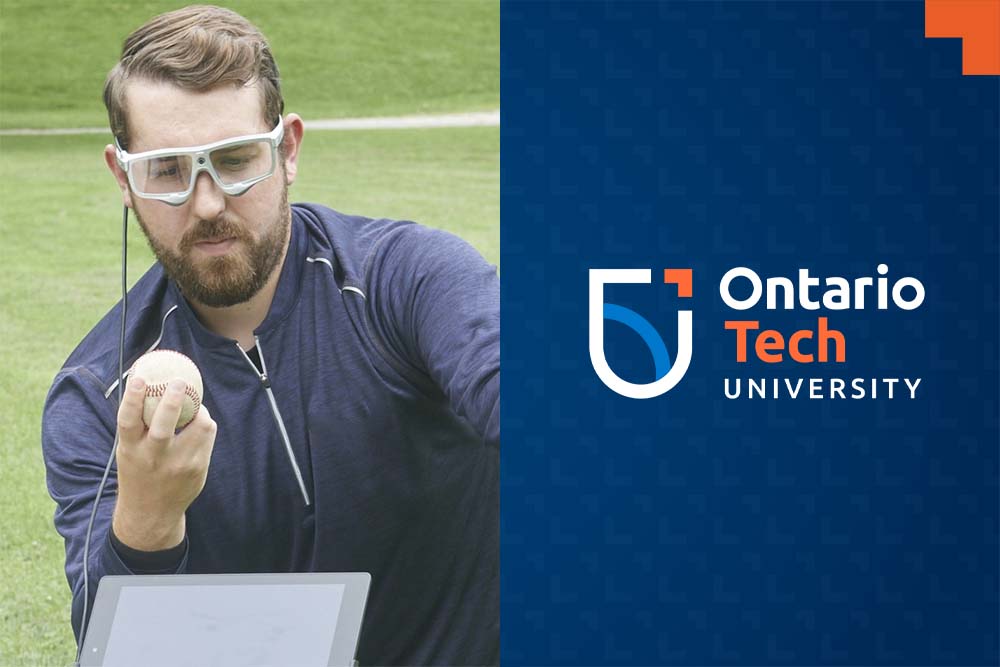 Ontario Tech University Health Sciences PhD candidate Matthew McCue looks at a baseball while wearing a mobile eye-tracker.