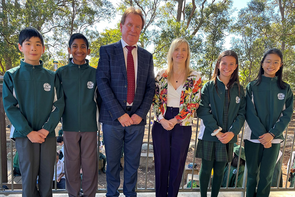 Dr. Carolyn McGregor with Baulkham Hills North Principal Graham Holmes and four current students serving as school captains and vice-captains (image courtesy of Baulkham Hills North Public School).
