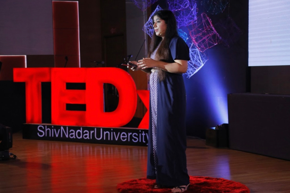 Fourth-year Ontario Tech University Computer Science student Japnit Ahuja, winner of a prestigious 2023 WomenTech Network international award, delivers a TEDx talk at Shiv Nadar University in Dadri, India.