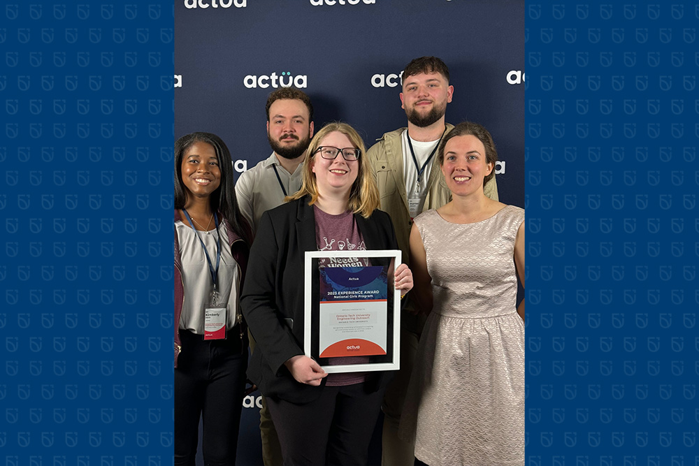 National accolade: Members of the Ontario Tech Engineering Outreach team celebrate receiving Actua’s 2023 Experience Award for its All Girls program.