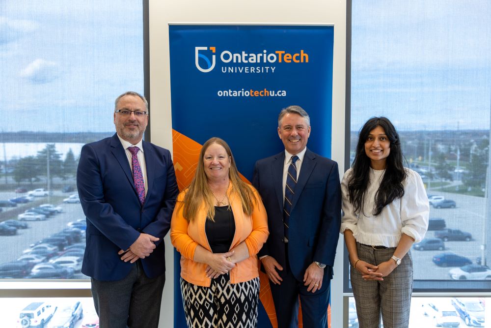 From left: Dr. Steven Murphy, President and Vice-Chancellor, Ontario Tech University; Beth Kelly, representing the Hann-Kelly Family; Dr. Pierre Côté, Hann-Kelly Family Chair in Research and Rehabilitation Research, Faculty of Health Sciences (FHSc) Ontario Tech University; Astrid DeSouza, PhD candidate, FHSc, Ontario Tech University (at Shawenjigewining Hall, April 10, 2024).