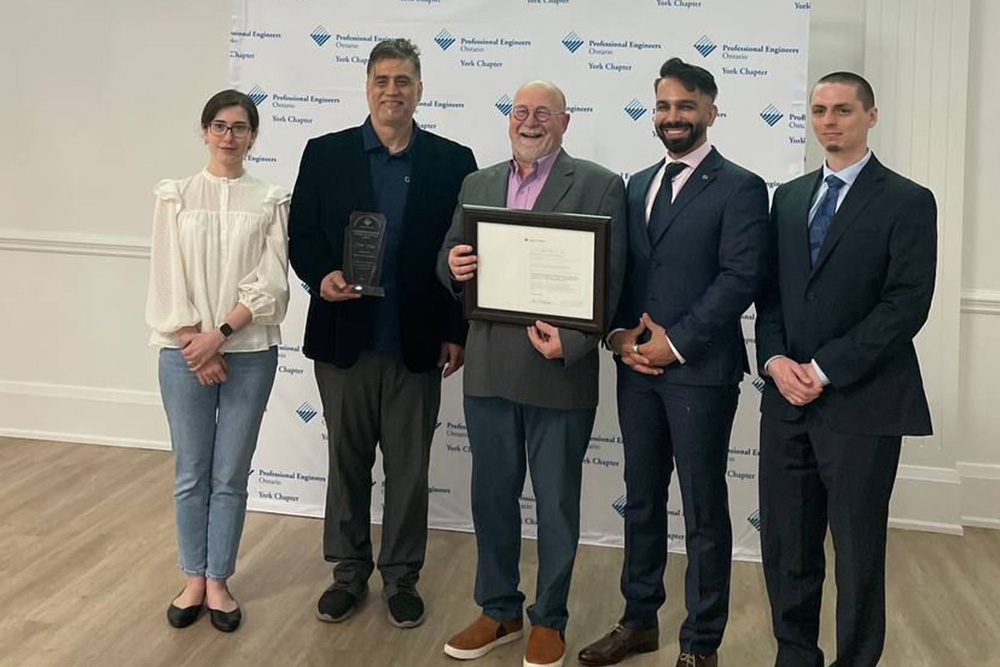 Yasaman Farahnak Majd, FEAS PhD candidate, Dr. Ahmad Barari, Professor, FEAS, John Komar,John Komar, Executive Director, ACE,  Dr. Mohsen Tayefeh, FEAS Research Associate and Industrial Engineering Supervisor at Ontario Tech, and Dylan Bender, FEAS PhD candidate, at the award ceremony with PEO York Chapter on May 26, 2024.