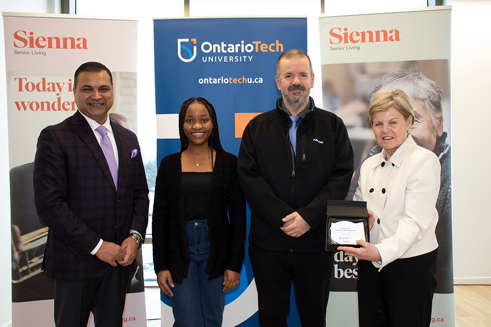 From left: Nitin Jain, President and CEO, Sienna Senior Living; Gloria Koya, second-year Nursing student and Sienna Senior Living Nursing Scholarship recipient; Attila Kovacs, fourth-year Nursing student and Sienna Senior Living Nursing Scholarship recipient; and Nancy Webb, Executive Vice-President, Corporate Affairs and Marketing, Sienna Senior Living.