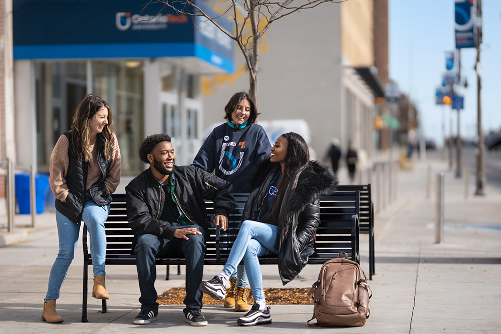 Students outside the Regent Theatre at Ontario Tech University's downtown Oshawa location.