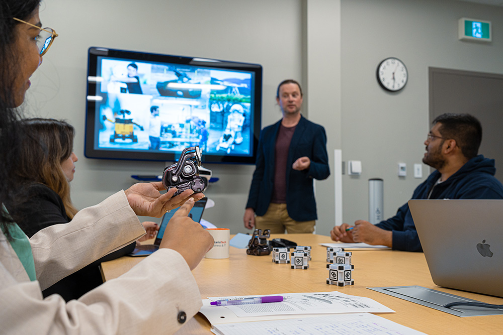 Dr. Peter Lewis, Associate Professor and the Canada Research Chair in Trustworthy Artificial Intelligence, speaks in the Trustworthy AI Lab at Ontario Tech University.