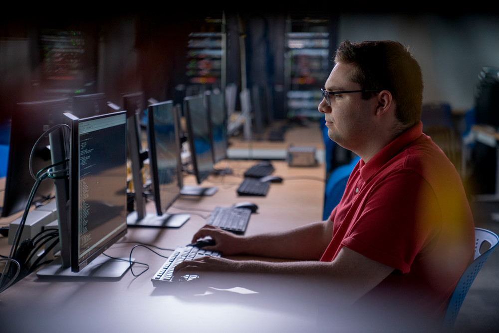 Student using computer in a lab at Ontario Tech University