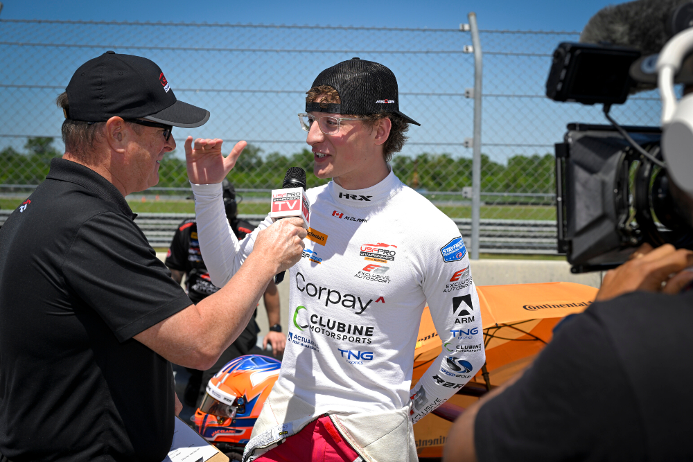 Mac Clark, Ontario Tech University Automotive Engineering student and a driver in the USF Pro 2000 Championship junior IndyCar, gives an interview following one of his races.