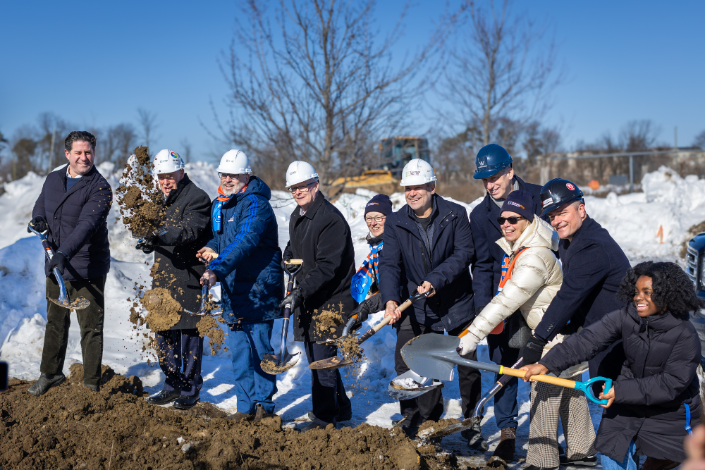From left: Tito-Dante Marimpietri, Oshawa Regional Councillor; Lorne Coe, Member of Provincial Parliament for Whitby; Parliamentary Assistant (PA) to the Minister of Colleges, Universities, Research Excellence and Security; and PA to the Minister of Children, Community and Social Services; Dr. Steven Murphy, President and Vice-Chancellor, Ontario Tech University; John Henry, Durham Regional Chair; Dr. Lori Livingston, Provost and Vice-President, Academic, Ontario Tech; Henry Morton, President, Campus Suites; Nick Macrae, President, Woodbourne; Laura Elliott, Chair, Ontario Tech Board of Governors; Kris Barnard, Senior Vice-President, Operations, Buttcon; and Eloghosa Avenbuan, President, Ontario Tech Student Union, at the future site of the The Ridge, the university’s new on-campus residence.