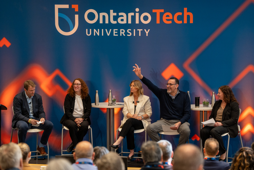 Participants in the Learning with AI - Opportunities and Ethical Challenges in Education panel at Ontario Tech University's inaugural AI Forum. From left: Brian Gallant, CEO, Space Canada (moderator); Dr. Amanda Cooper, Dean and Professor, Frazer Faculty of Education, Ontario Tech; Jennifer Flanagan, Co-founder and CEO, Actua; Dr. Qusay Mahmoud, Assistant Dean, Engineering Outreach and Professor, Faculty of Engineering and Applied Science, Ontario Tech; and Sheri Williams, Managing Director, Accenture Industry X, Canada.