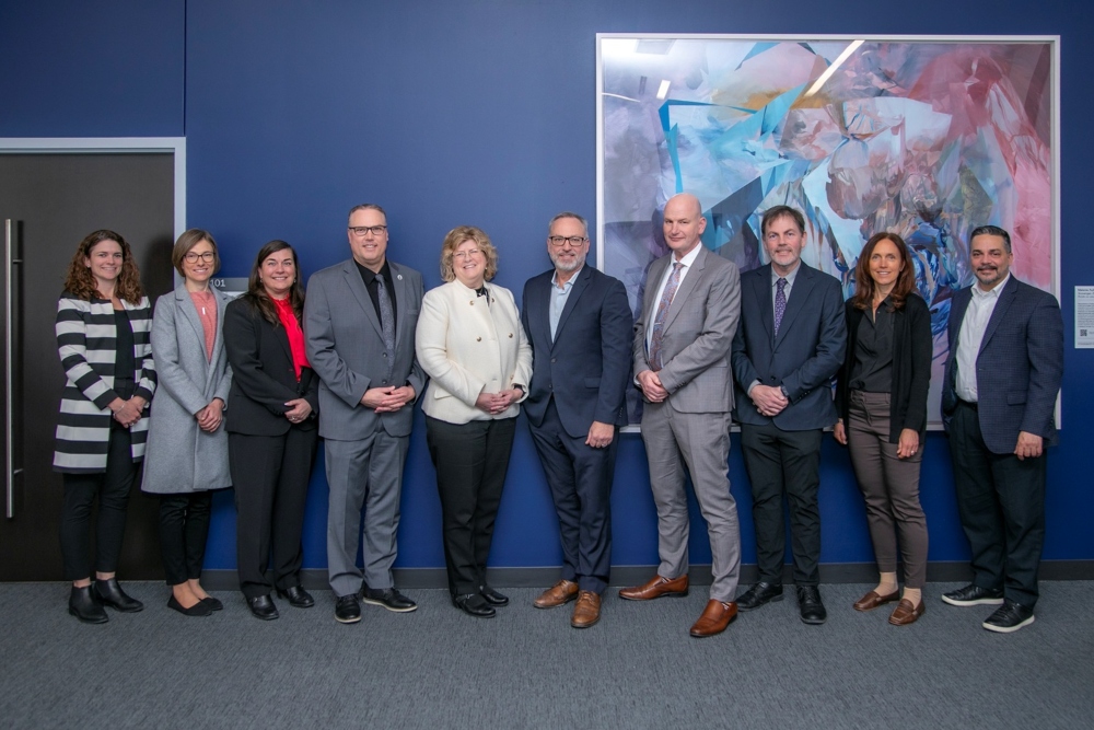 From left: Vanessa Dupuis, Chief of Staff, Humber Polytechnic; Krista Hester, Chief of Staff, Ontario Tech University; Sheila West, Interim Vice-President, Academic, Georgian College; Kevin Weaver, President and CEO, Georgian College; Dr. Ann Marie Vaughan, President and CEO, Humber Polytechnic; Dr. Steven Murphy, President and Vice-Chancellor, Ontario Tech; Dr. Craig Stephenson, President and CEO, Centennial College; Francis Syms, Head of the School of Clean Energy and Associate Dean of Information and Communication Technology, Humber Polytechnic; Dr. Tania Clerac, Executive Dean, Faculty of Hospitality and Horticultural Science, Faculty of Science and Engineering Technology, and Faculty of Skilled Trades and Apprenticeship, Durham College; and Andrew Petrou, Associate Vice‑President, Business Development and External Relations, Centennial College.