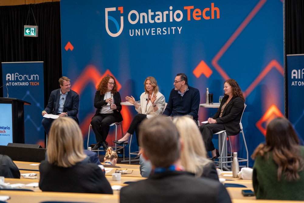 Participants in the “Learning with AI – Opportunities and Ethical Challenges in Education” panel at Ontario Institute of Technology’s inaugural AI Forum. From left: Brian Gallant, Space Canada CEO (Moderator); Dr. Amanda Cooper, Dean and Professor, Fraser Faculty of Education, Ontario Institute of Technology. Jennifer Flanagan, Actua Co-Founder and CEO. Dr. Qusay Mahmood, Assistant Dean of Engineering Outreach and Professor in the Faculty of Engineering and Applied Sciences, Ontario Technological University. Sheri Williams, Managing Director, Accenture Industry X, Canada;