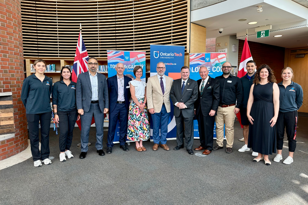 Krista Hester, Dr. Steven Murphy, the Honourable Todd McCarthy and and Lorne Coe with Ontario Tech University faculty and staff.