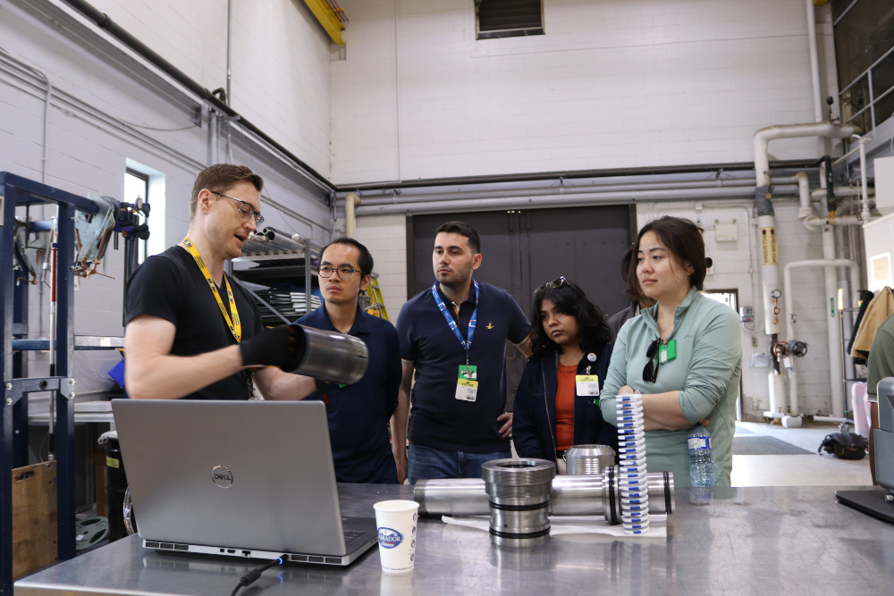 Ontario Tech University graduate students in the Remote Tooling and Equipment Laboratory at Canadian Nuclear Laboratories in Chalk River, Ontario.